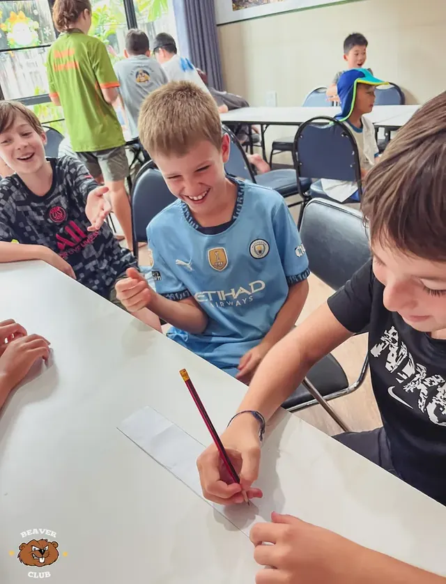 Children working together on a hands-on classroom activity at Beaver Club