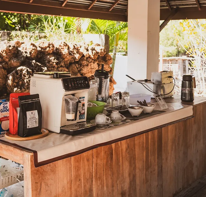 Coffee equipment and a counter in the open-air café at Beaver Club