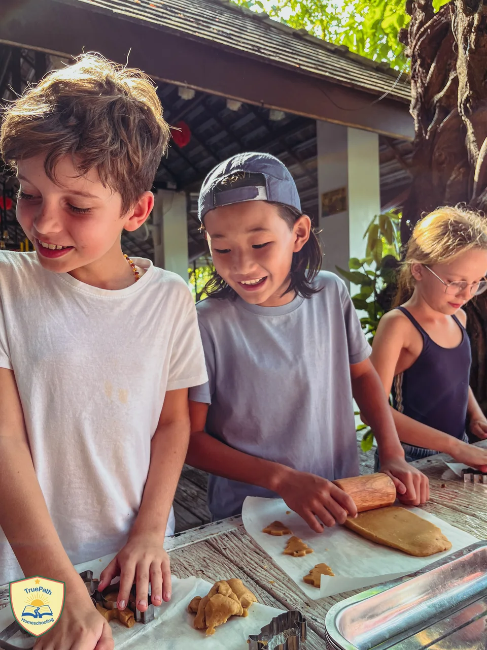 Children preparing food together during a practical cooking project